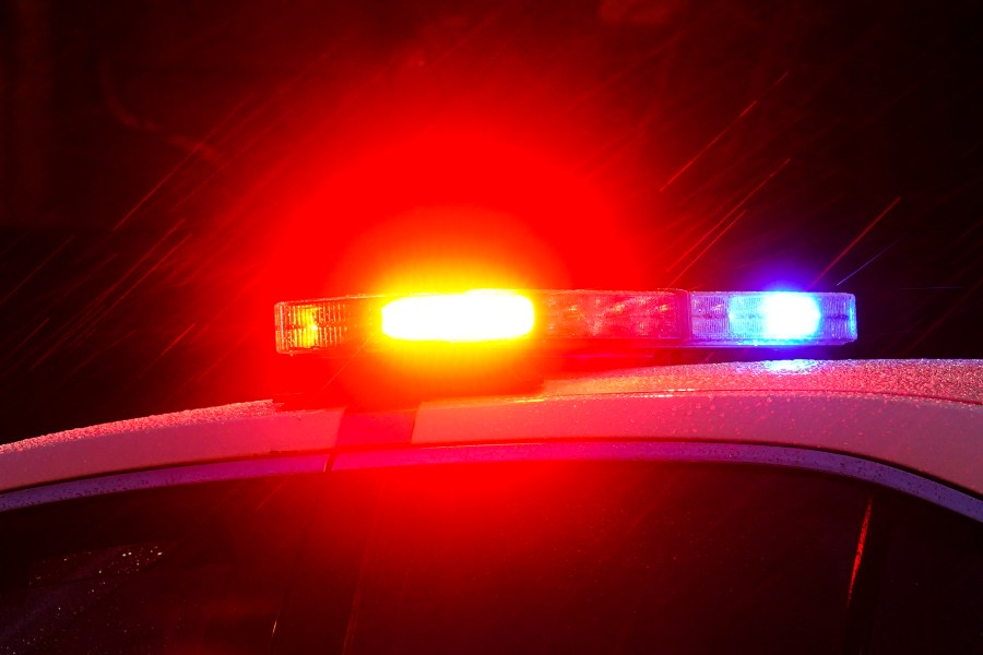 FILE - A police vehicle flashes its lights in Philadelphia, Monday, Jan. 17, 2022. (AP Photo/Matt Rourke, File)