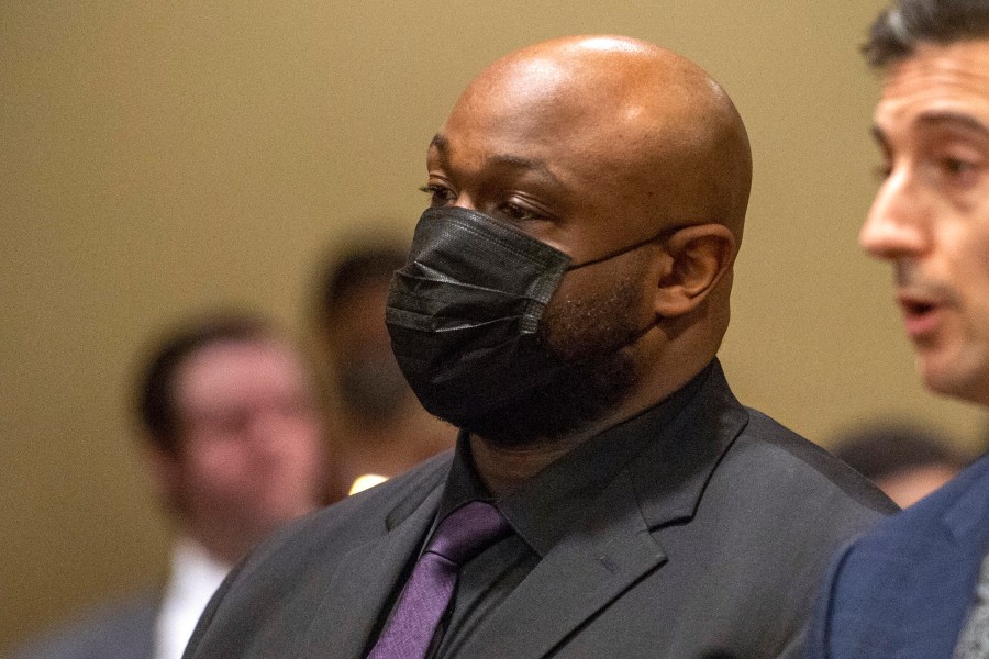 FILE - Former Memphis police officer, Desmond Mills Jr., accused of murder in the death of Tyre Nichols, appears with his attorney at an indictment hearing at the Shelby County Criminal Justice Center in Memphis, Tenn., Feb. 17, 2023. (AP Photo/Brandon Dill, File)