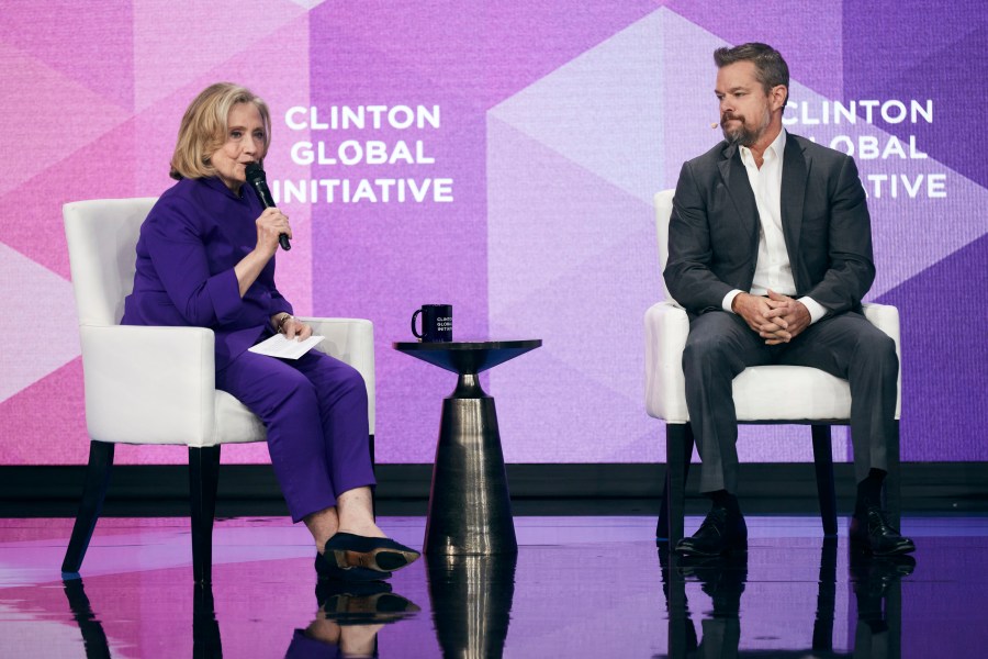 Hillary Clinton, 67th Secretary of State of the United States, left, speaks with. Matt Damon, right, on Monday, Sept. 23, 2024, in New York. (AP Photo/Andres Kudacki)