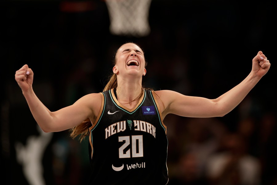 New York Liberty guard Sabrina Ionescu reacts during the second half of a first-round WNBA basketball playoff game against the Atlanta Dream, Tuesday, Sept. 24, 2024, in New York. The Liberty won 91-82 to clinch the series 2-0. (AP Photo/Adam Hunger)