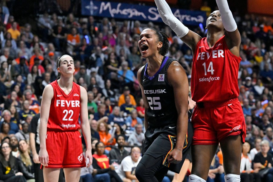 Connecticut Sun forward Alyssa Thomas (25) celebrates a basket while being fouled during the second half in Game 2 of a first-round WNBA basketball playoff series against the Indiana Fever, Wednesday, Sept. 25, 2024, in Uncasville, Conn. (AP Photo/Jessica Hill)