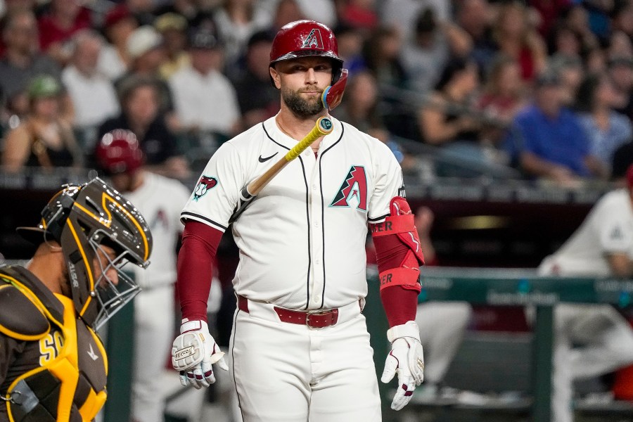 Arizona Diamondbacks' Christian Walker reacts after a pitch call against the San Diego Padres during the first inning of a baseball game, Sunday, Sept. 29, 2024, in Phoenix. (AP Photo/Darryl Webb)