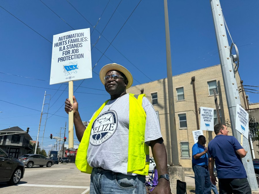 Striking International Longshoremen's Association dockworker Henderson Wilson, 61, stands on the picket line near the Port of New Orleans in Louisiana, Tuesday, Oct. 1, 2024. (AP Photo/Jack Brook)