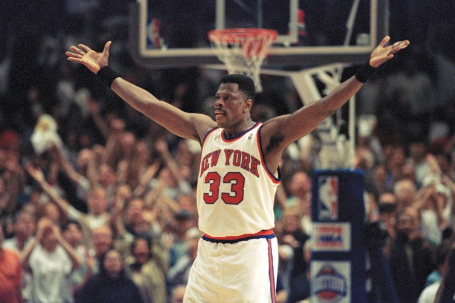 FILE - New York Knicks center Patrick Ewing pumps up the fans crowded into New York's Madison Square Garden in New York, May 22, 1994. (AP Photo/Bill Kostroun, File)