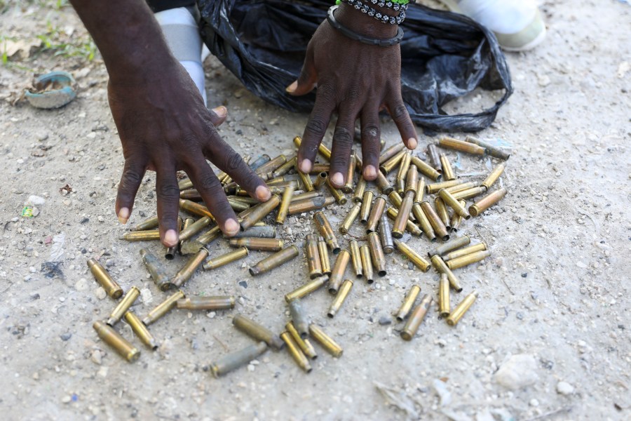 Local Frantz Baptist shows bullet casings he collected from the streets near his home days after an armed gang attack on Pont-Sonde, Haiti, Tuesday, Oct. 8, 2024. (AP Photo/Odelyn Joseph)