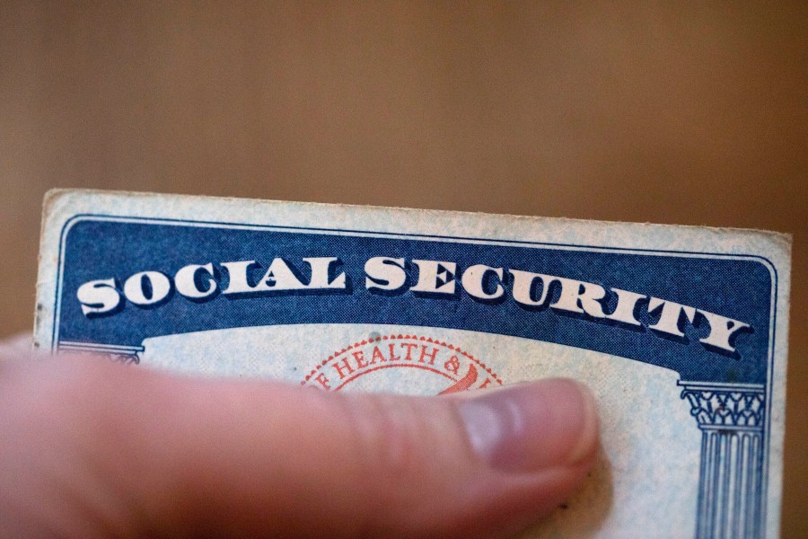 FILE - A Social Security card is displayed on Oct. 12, 2021, in Tigard, Ore. (AP Photo/Jenny Kane, File)