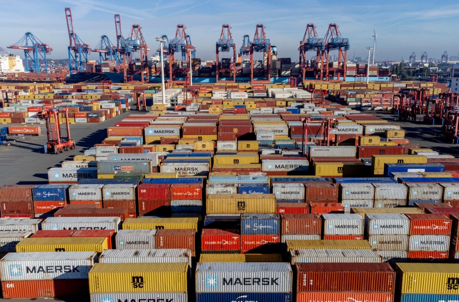 FILE - Containers are piled up in the harbor in Hamburg, Germany, Wednesday, Oct. 26, 2022. (AP Photo/Michael Probst, file)