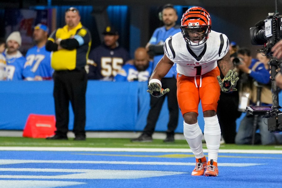 Cincinnati Bengals wide receiver Ja'Marr Chase celebrates his touchdown catch during the second half of an NFL football game against the Los Angeles Chargers Sunday, Nov. 17, 2024, in Inglewood, Calif. (AP Photo/Eric Thayer)