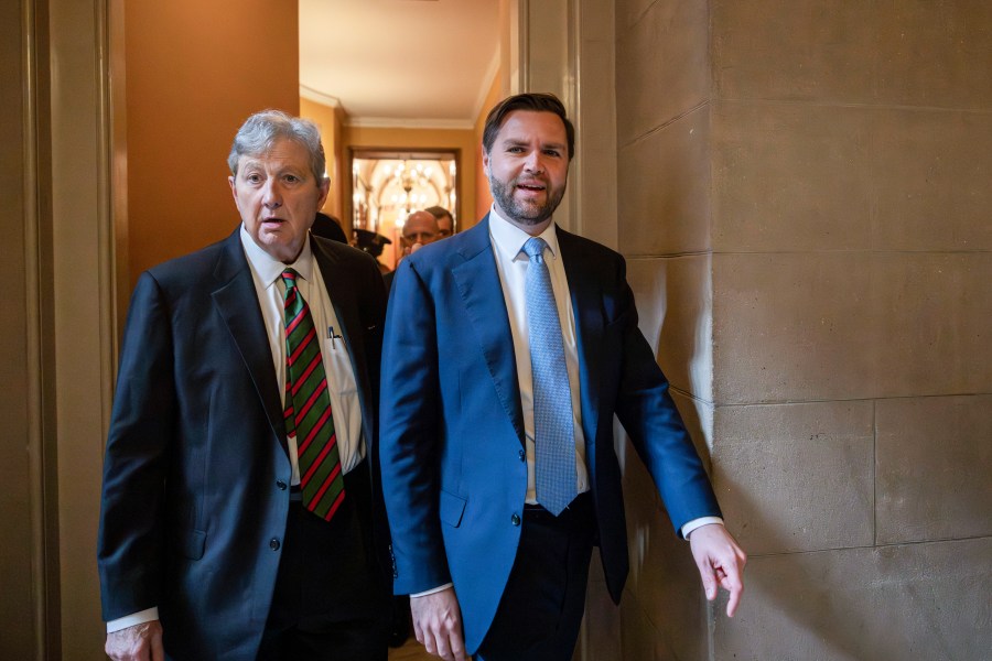 Vice President-elect JD Vance, right, and Sen. John Kennedy, R-La., left, walk out of a meeting with President-elect Donald Trump's nominee to be attorney general, former Rep. Matt Gaetz, R-Fla., and Republican Senate Judiciary Committee members, at the Capitol in Washington, Wednesday, Nov. 20, 2024. (AP Photo/Ben Curtis)