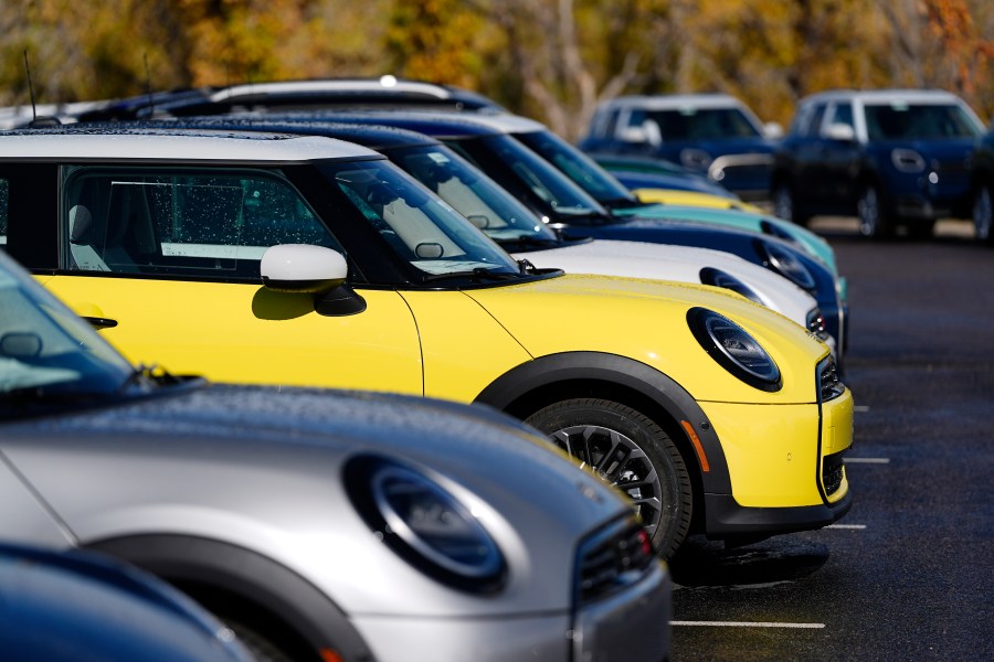 FILE - Unsold 2025 Cooper S hardtops are displayed at a Mini dealership on Oct. 21, 2024, in Highlands Ranch, Colo. (AP Photo/David Zalubowski, File)