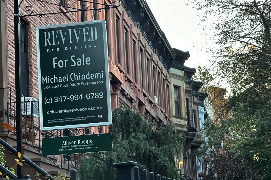 FILE - A for sale sign hangs outside a home in the Brooklyn borough of New York on Nov. 13, 2024. (AP Photo/Peter Morgan, File)