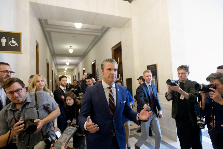 Pete Hegseth, President-elect Donald Trump's pick for secretary of defense, speaks with reporters following a meeting with senators on Capitol Hill, Thursday, Nov. 21, 2024, in Washington. (AP Photo/Rod Lamkey, Jr.)