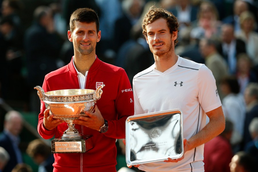 FILE - Serbia's Novak Djokovic, left, and Britain's Andy Murray holds their trophy after their final match of the French Open tennis tournament at the Roland Garros stadium, Sunday, June 5, 2016 in Paris. (AP Photo/Alastair Grant, File)