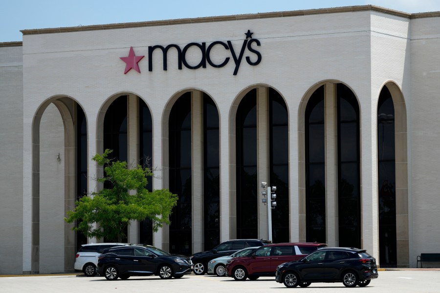 FILE - Cars are parked in front of a Macy's store at Hawthorn Mall in Vernon Hills, Ill., June 3, 2024. (AP Photo/Nam Y. Huh, File)