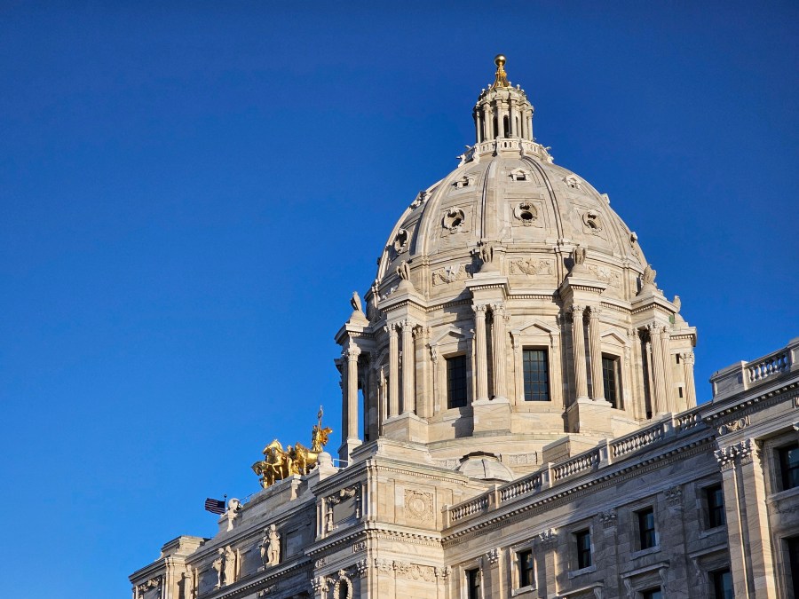 FILE - Morning light strikes the Minnesota State Capitol in St. Paul on Wednesday, March 20, 2024. (AP Photo/Steve Karnowski, File)