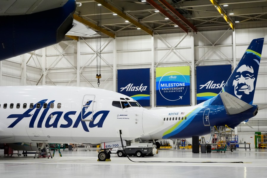 FILE - Alaska Airlines aircraft sits in the airline's hangar at Seattle-Tacoma International Airport, Jan. 10, 2024, in SeaTac, Wash. (AP Photo/Lindsey Wasson, File)