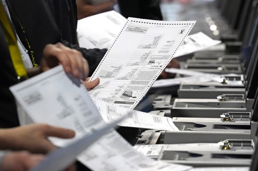 FILE - Election workers recount ballots from the recent Pennsylvania Senate race at the Allegheny County Election Division warehouse on the Northside of Pittsburgh, Wednesday, Nov. 20, 2024. (AP Photo/Gene J. Puskar, File)