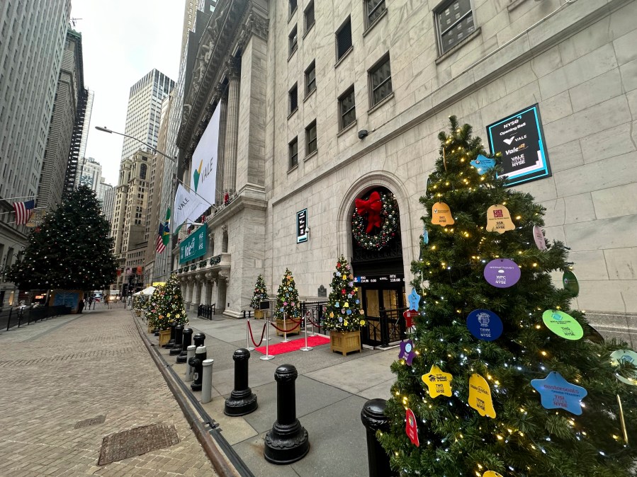 Holiday decorations are shown in front of the New York Stock Exchange in New York's Financial District on Tuesday, Dec. 3, 2024. (AP Photo/Peter Morgan)