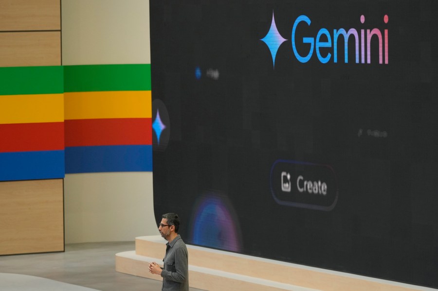 FILE - Alphabet CEO Sundar Pichai speaks about Gemini at a Google I/O event in Mountain View, Calif., May 14, 2024. (AP Photo/Jeff Chiu)