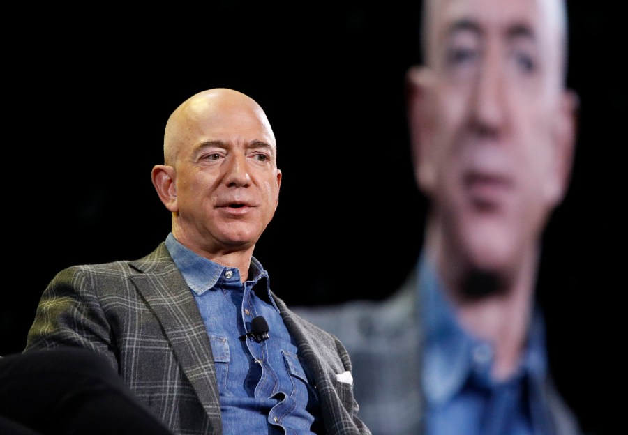 FILE - Amazon CEO Jeff Bezos speaks in Las Vegas on June 6, 2019. (AP Photo/John Locher, File)