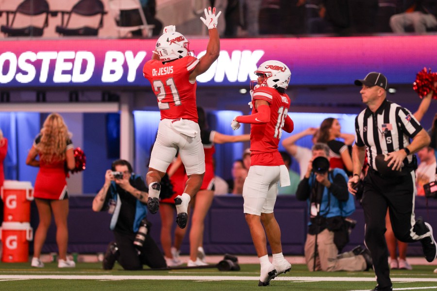 UNLV wide receiver Kayden McGee, right, celebrates his touchdown with wide receiver Jacob De Jesus during the first half of the LA Bowl NCAA college football game against California Wednesday, Dec. 18, 2024, in Inglewood, Calif. (AP Photo/Ryan Sun)