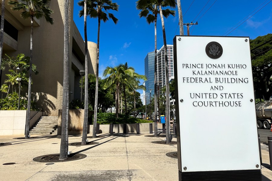 FILE - A sign for the Prince Jonah Kuhio Kalanianaole Federal Building and Courthouse is displayed outside the courthouse on Monday, Jan. 22, 2024, in Honolulu. (AP Photo/Jennifer Kelleher, File)