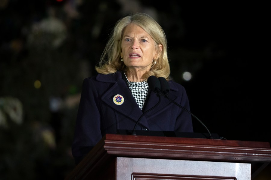 Sen. Lisa Murkowski, R-Alaska, speaks during the U.S. Capitol Christmas tree lighting ceremony on the West Front of the Capitol, Tuesday, Dec. 3, 2024, in Washington. (AP Photo/Mark Schiefelbein)